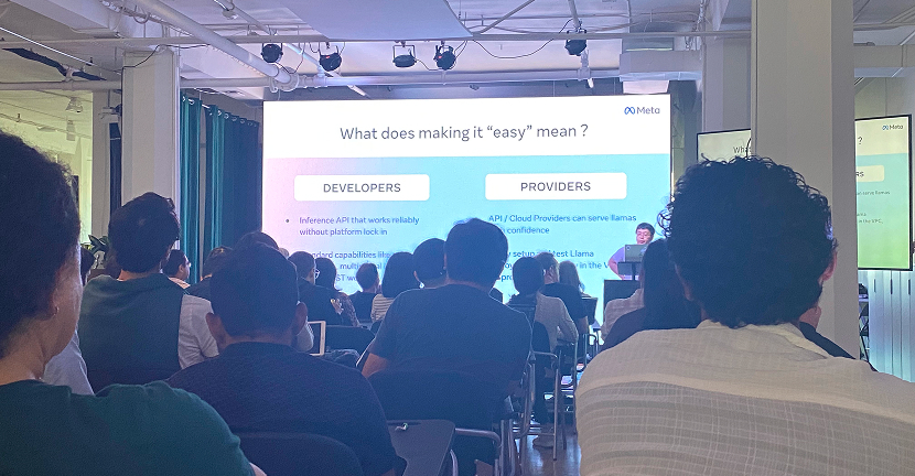 MetaによるAI関連セッション。スクリーンに「What does making it 'easy' mean?」というスライドが表示され、開発者とクラウドプロバイダーの視点からの議論が行われている。